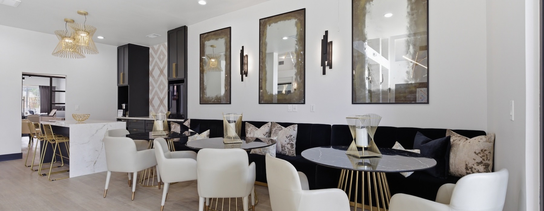 a clubroom with tables and chairs