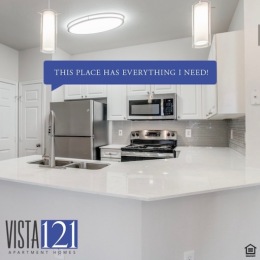 a kitchen with white cabinets