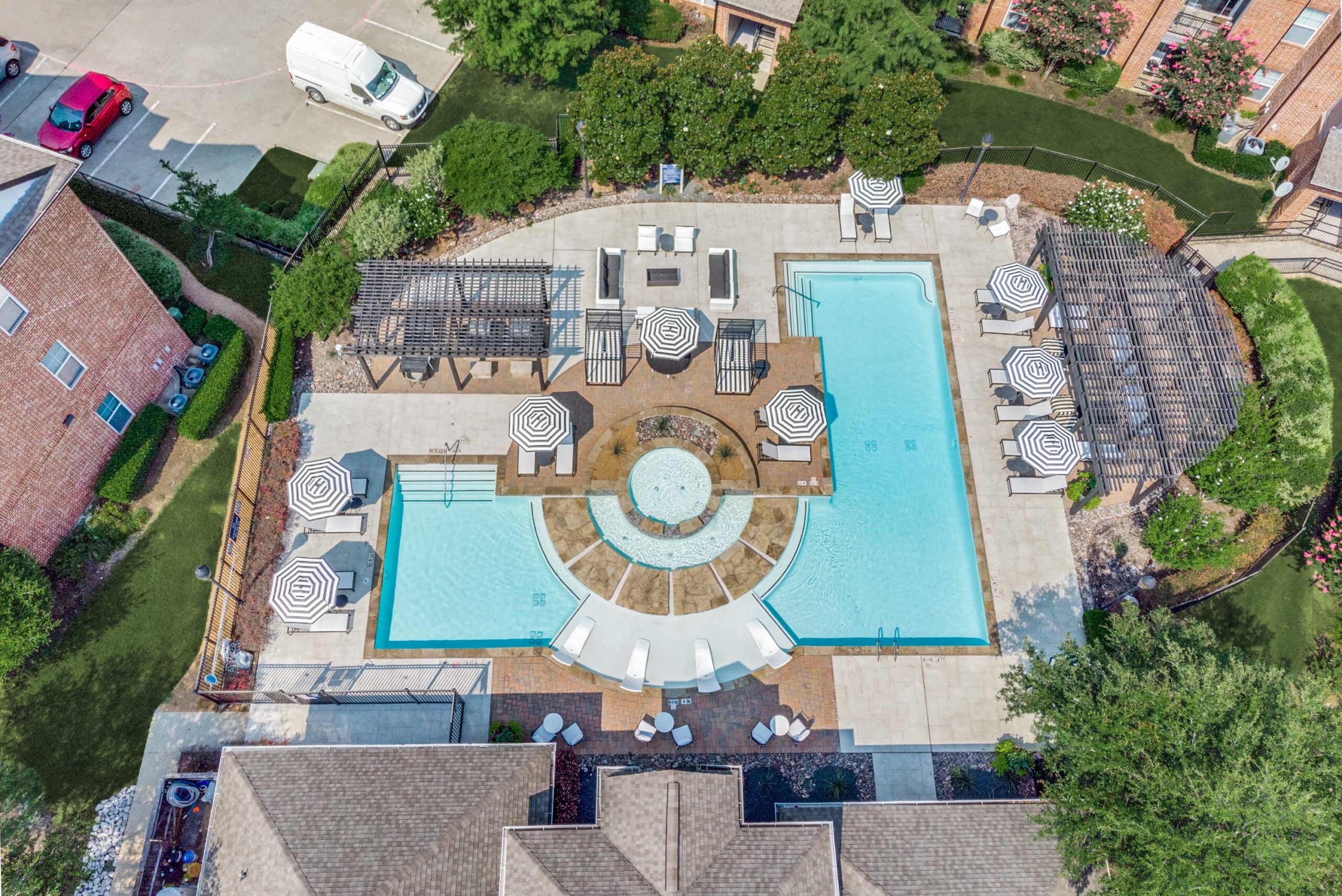 aerial view of the outdoor pool and clubhouse at vista 121 apartments